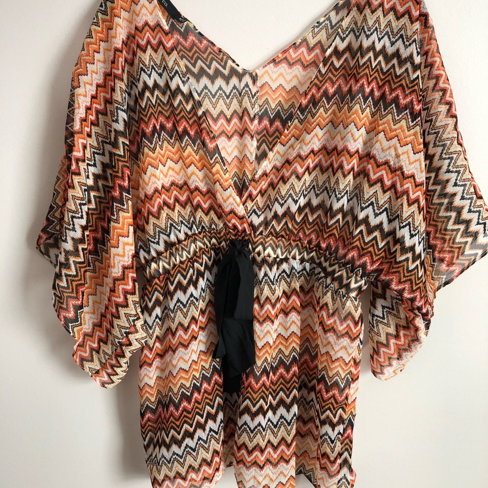 Flowy orange and black blouse